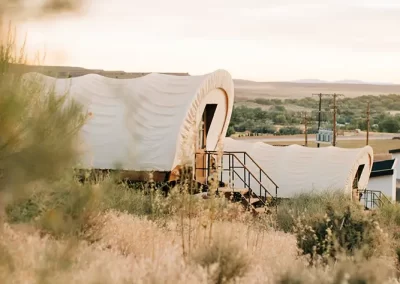 Unique desert eco-pods in a serene landscape.